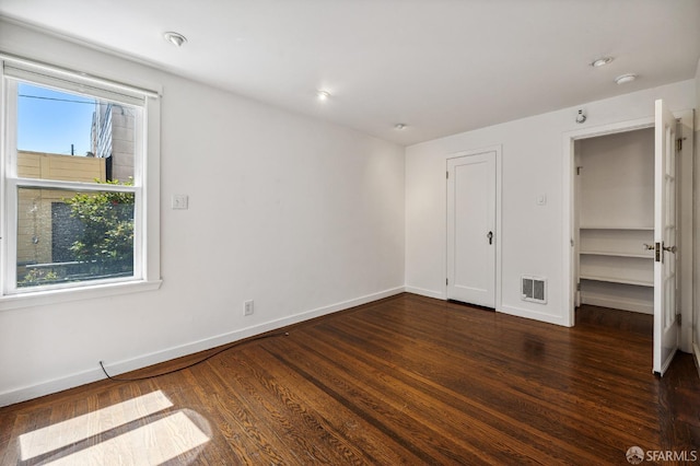 1375 Sacramento St, San Francisco, CA 94109 - unfurnished bedroom featuring baseboards and dark wood finished floors