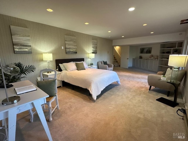 bedroom with light carpet