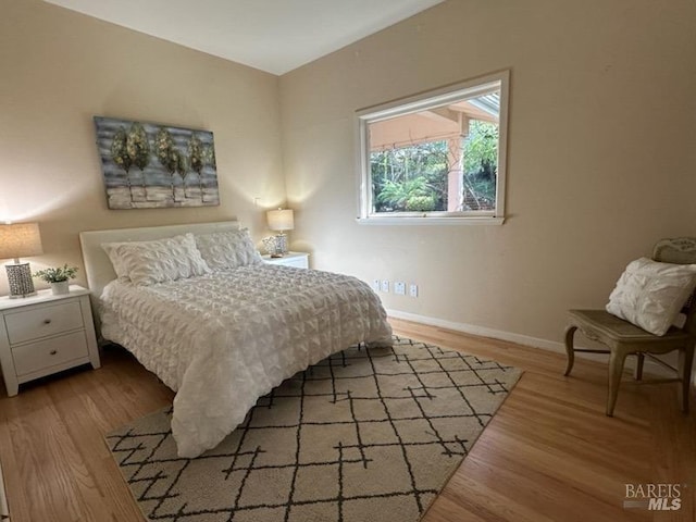 bedroom featuring hardwood / wood-style flooring