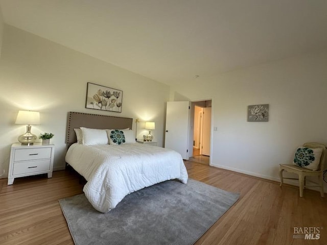 bedroom featuring hardwood / wood-style flooring