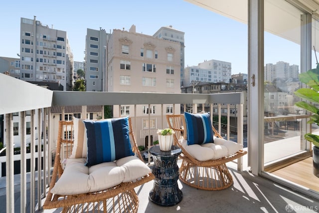 balcony featuring a view of city