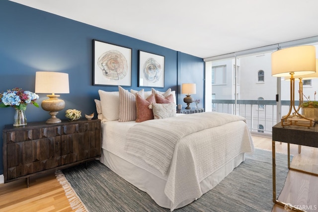 bedroom featuring wood finished floors