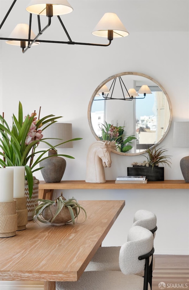 dining area featuring an inviting chandelier