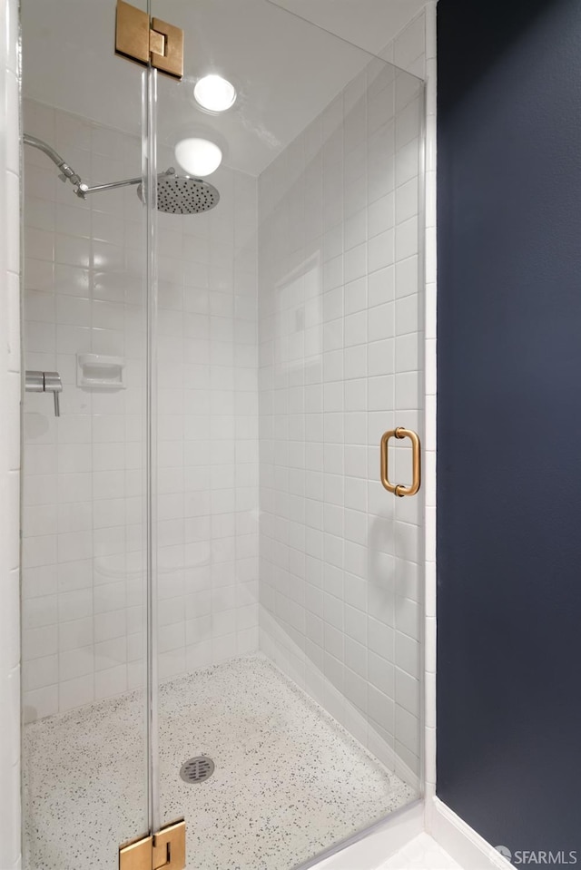 full bathroom with a stall shower