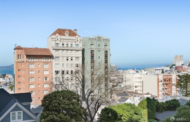 view of building exterior featuring a view of city