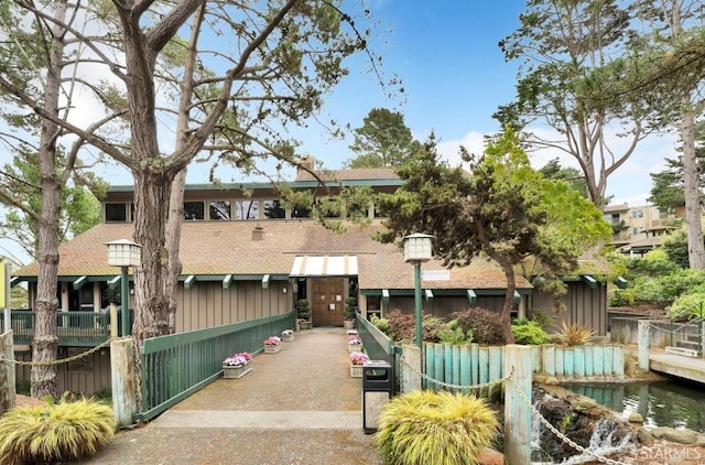 view of property's community featuring a water view