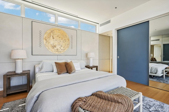 bedroom featuring hardwood / wood-style floors