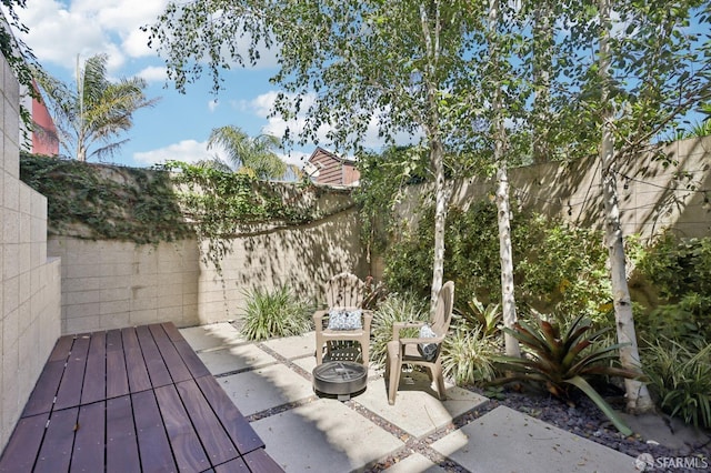 exterior space with an outdoor fire pit