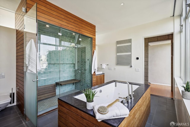 full bathroom with tile patterned flooring, vanity, toilet, and plus walk in shower