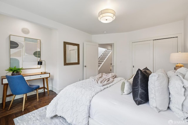 2266 Cecilia Ave, San Francisco, CA 94116 - bedroom featuring a closet and dark wood finished floors