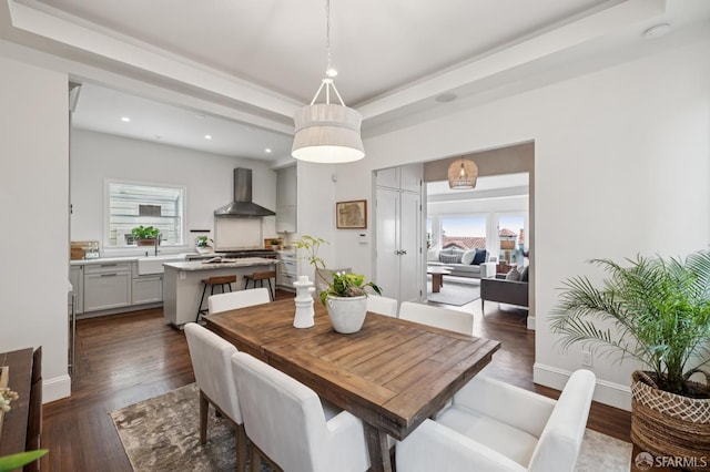 2266 Cecilia Ave, San Francisco, CA 94116 - dining room featuring dark wood-type flooring, recessed lighting, and a tray ceiling