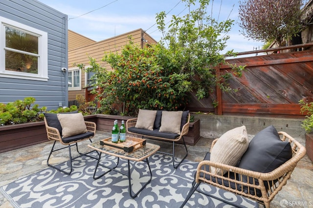 2266 Cecilia Ave, San Francisco, CA 94116 - fenced backyard featuring a patio area and outdoor lounge area