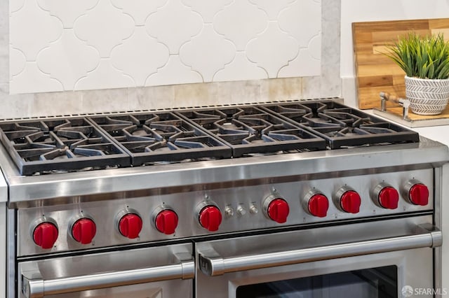 2266 Cecilia Ave, San Francisco, CA 94116 - kitchen view of high end stainless steel range oven and tasteful backsplash