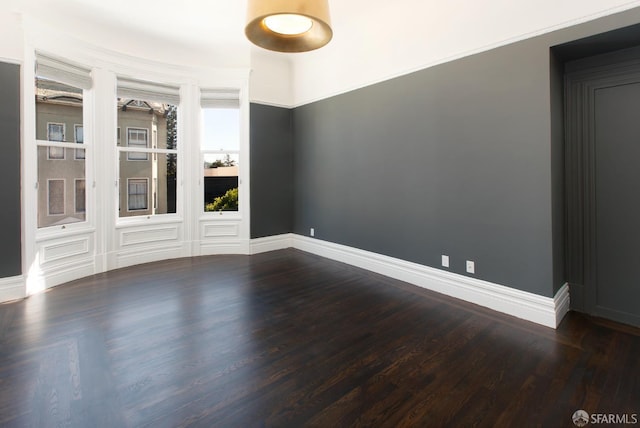 245 Scott St, San Francisco, CA 94117 - unfurnished room featuring baseboards and dark wood finished floors