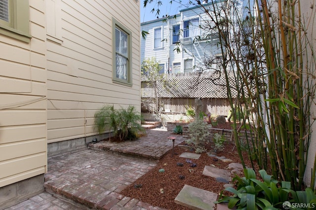 245 Scott St, San Francisco, CA 94117 - view of yard with a patio area and fence