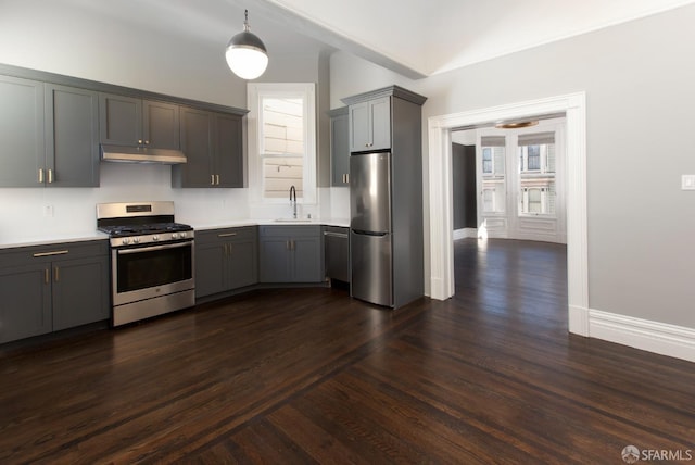 245 Scott St, San Francisco, CA 94117 - kitchen featuring light countertops, appliances with stainless steel finishes, gray cabinetry, and under cabinet range hood