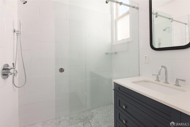 245 Scott St, San Francisco, CA 94117 - bathroom with vanity, tile walls, and walk in shower