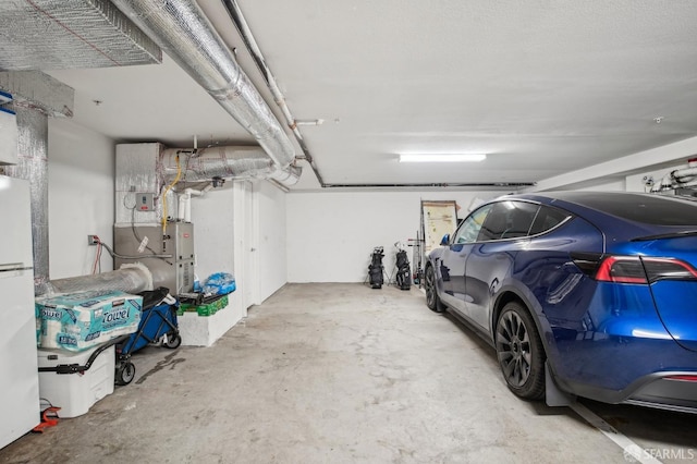 176 Summit Way, San Francisco, CA 94132 - garage featuring freestanding refrigerator and heating unit