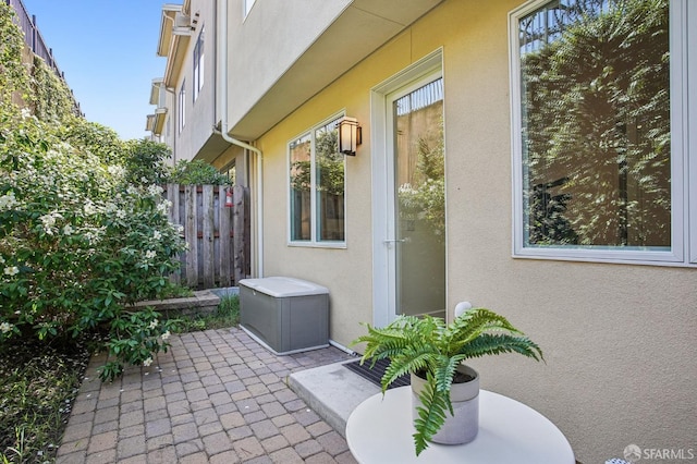 176 Summit Way, San Francisco, CA 94132 - view of home's exterior with stucco siding, a patio area, and fence