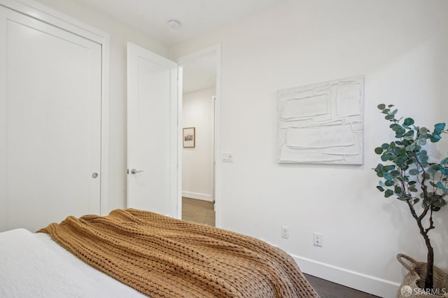 176 Summit Way, San Francisco, CA 94132 - bedroom featuring baseboards and dark wood finished floors