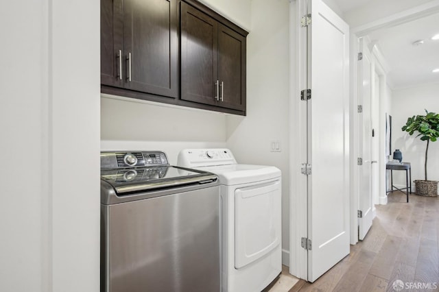 176 Summit Way, San Francisco, CA 94132 - clothes washing area with cabinet space, washer and dryer, and light wood finished floors