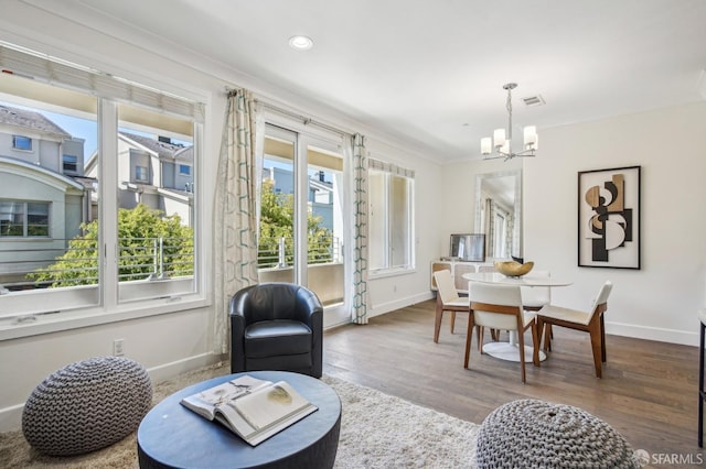 176 Summit Way, San Francisco, CA 94132 - living area featuring a chandelier, baseboards, wood finished floors, recessed lighting, and ornamental molding