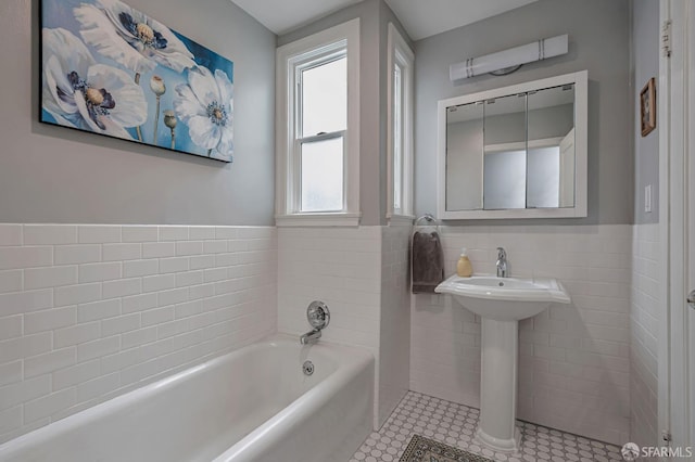 1655 24th Ave, San Francisco, CA 94122 - full bath featuring tile walls, a garden tub, a wainscoted wall, a sink, and tile patterned floors