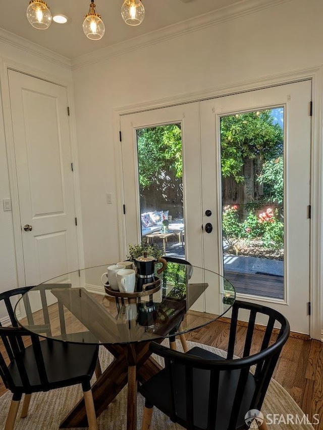 192 Ridgeway Ave, Oakland, CA 94611 - dining space featuring crown molding, wood finished floors, and french doors