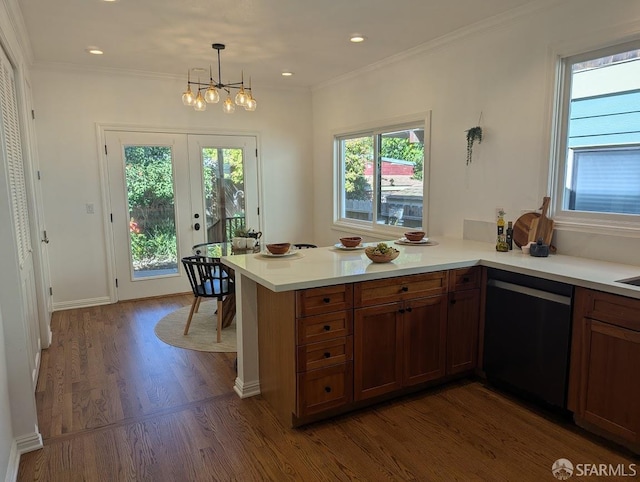 192 Ridgeway Ave, Oakland, CA 94611 - kitchen featuring dishwasher, dark wood finished floors, light countertops, a chandelier, and brown cabinetry