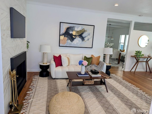 192 Ridgeway Ave, Oakland, CA 94611 - living area with wood finished floors, crown molding, and a large fireplace