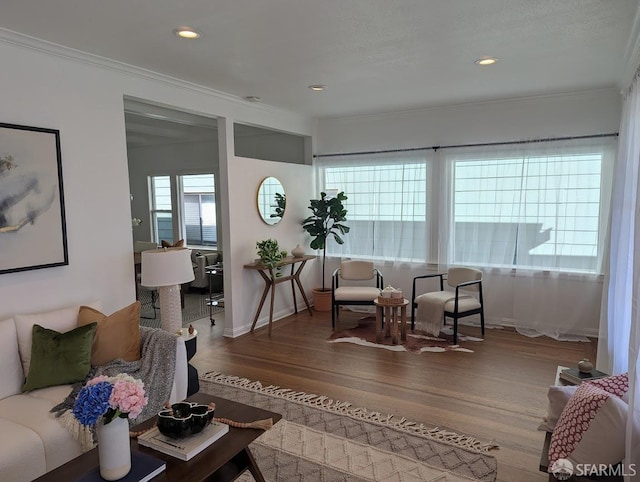 192 Ridgeway Ave, Oakland, CA 94611 - living room featuring wood finished floors, ornamental molding, and recessed lighting