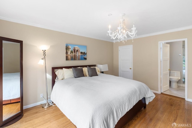 bedroom featuring light wood-style floors, a notable chandelier, ornamental molding, and baseboards