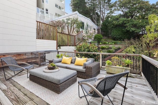 deck featuring fence and outdoor lounge area