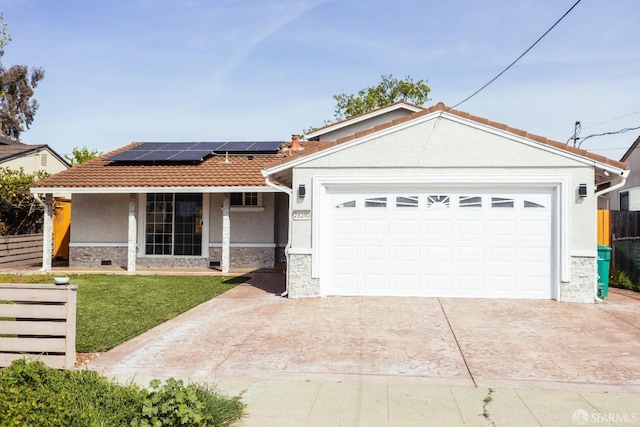 28290 Thackeray Ave, Hayward, CA 94544 - ranch-style home with stone siding, stucco siding, covered porch, a tiled roof, and roof mounted solar panels