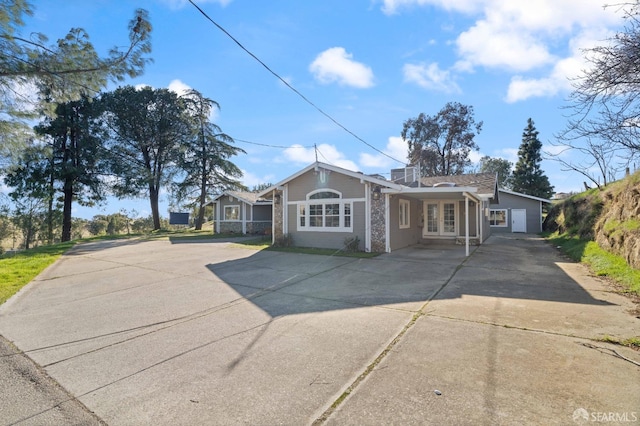 350 Camino Diablo Rd, Brentwood, CA 94513 - ranch-style home with stone siding, driveway, and french doors