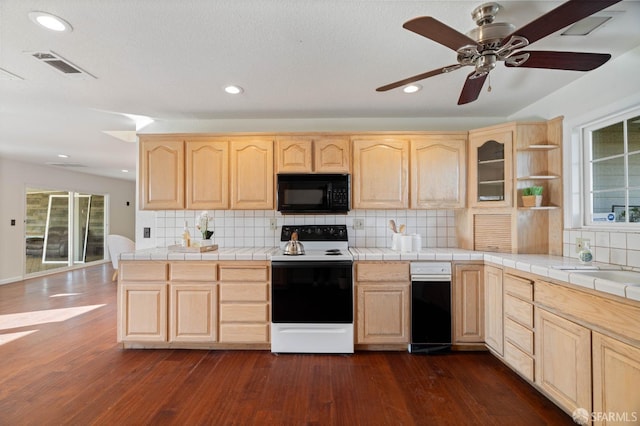 350 Camino Diablo Rd, Brentwood, CA 94513 - kitchen with black microwave, light brown cabinetry, electric stove, and visible vents