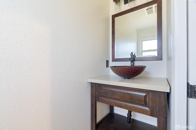 350 Camino Diablo Rd, Brentwood, CA 94513 - bathroom with visible vents, vanity, and a textured wall