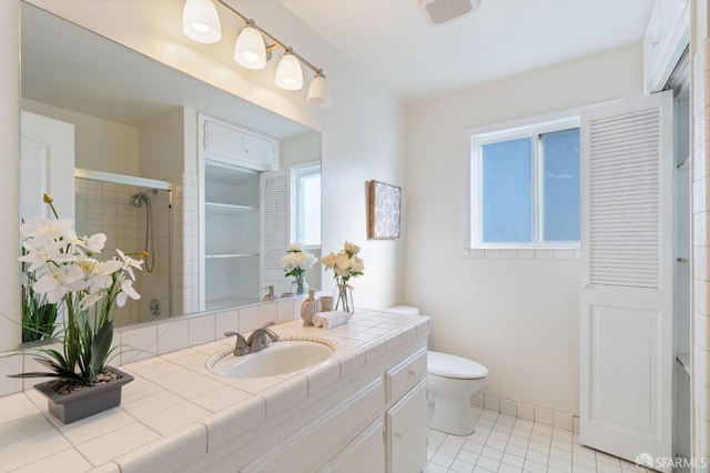 350 Camino Diablo Rd, Brentwood, CA 94513 - full bathroom with toilet, vanity, visible vents, tile patterned flooring, and tiled shower