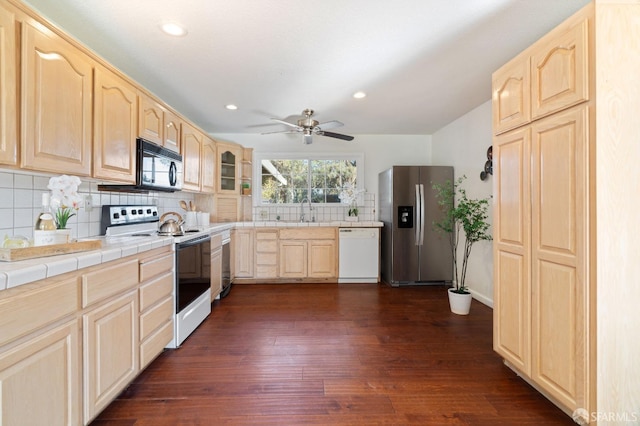 350 Camino Diablo Rd, Brentwood, CA 94513 - kitchen with white appliances, backsplash, light brown cabinetry, dark wood-style floors, and tile counters