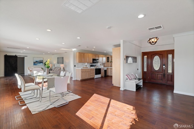 350 Camino Diablo Rd, Brentwood, CA 94513 - interior space featuring visible vents, a barn door, dark wood-type flooring, and recessed lighting