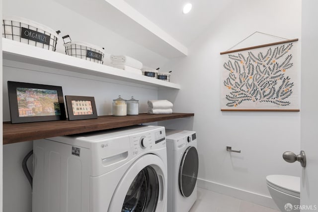 laundry area with laundry area, recessed lighting, tile patterned floors, baseboards, and washing machine and dryer