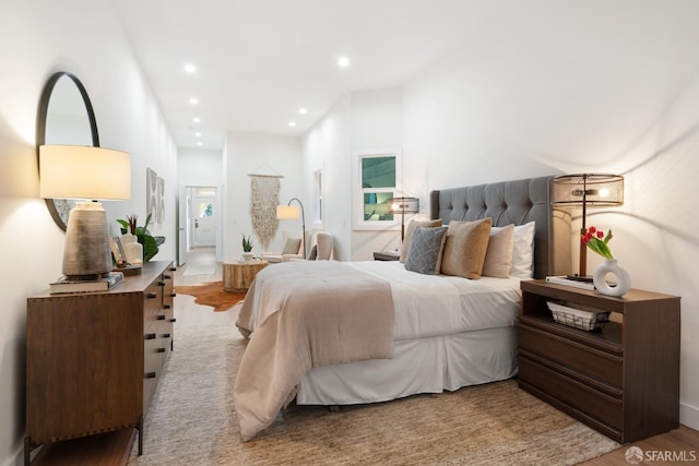 bedroom featuring recessed lighting and light wood-style floors