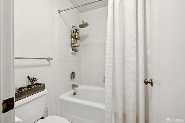 bathroom with toilet and shower / bathtub combination with curtain