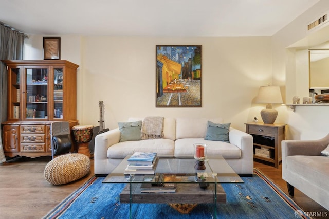 living room with hardwood / wood-style floors