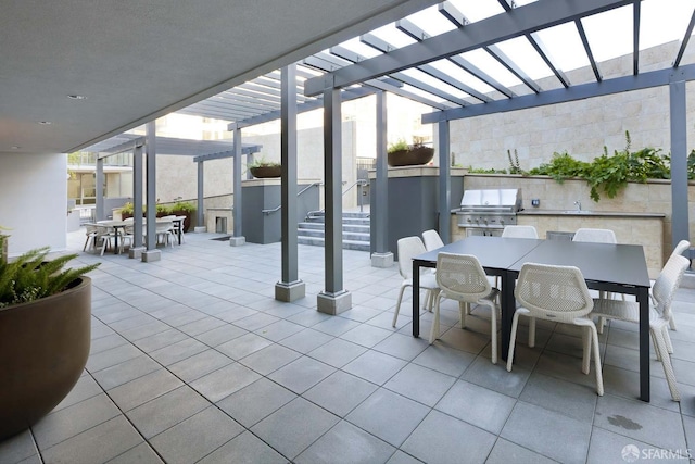 420 Mission Bay Blvd Unit 706, San Francisco, CA 94158 - view of patio with area for grilling, a pergola, and outdoor dining space