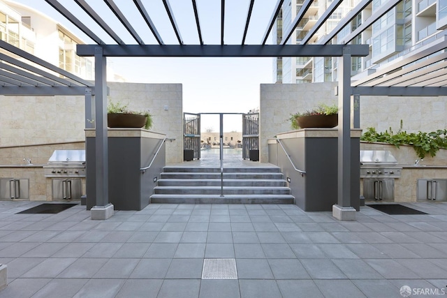 420 Mission Bay Blvd Unit 706, San Francisco, CA 94158 - view of patio featuring a pergola and area for grilling