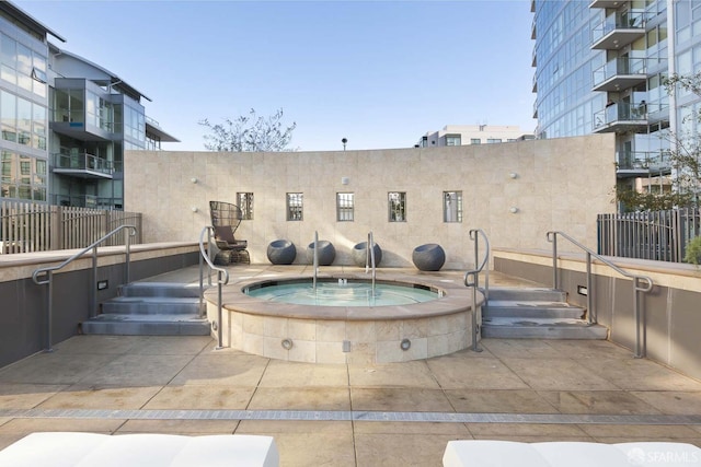420 Mission Bay Blvd Unit 706, San Francisco, CA 94158 - view of pool featuring fence and a community hot tub