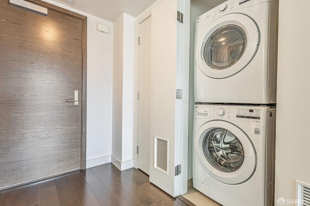 420 Mission Bay Blvd Unit 706, San Francisco, CA 94158 - laundry area featuring laundry area, stacked washer and dryer, wood finished floors, and visible vents