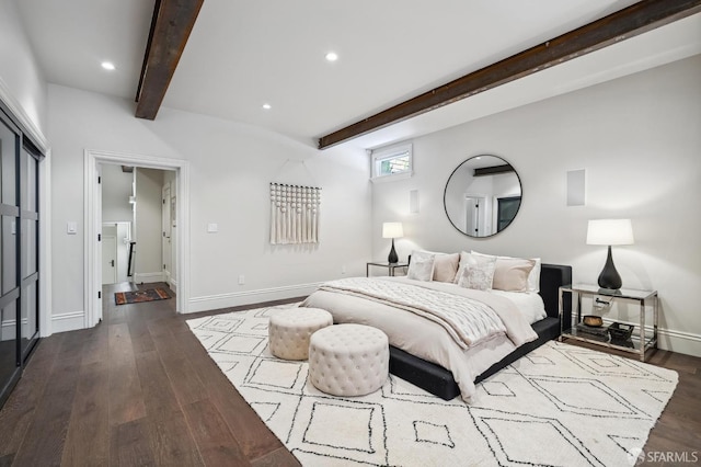 bedroom featuring beam ceiling and dark wood-type flooring