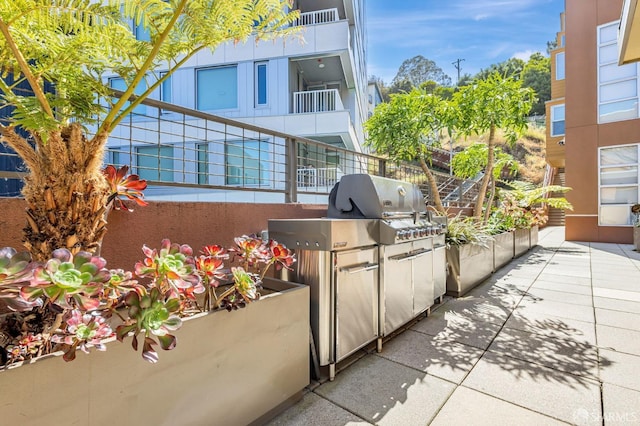 view of patio with an outdoor kitchen